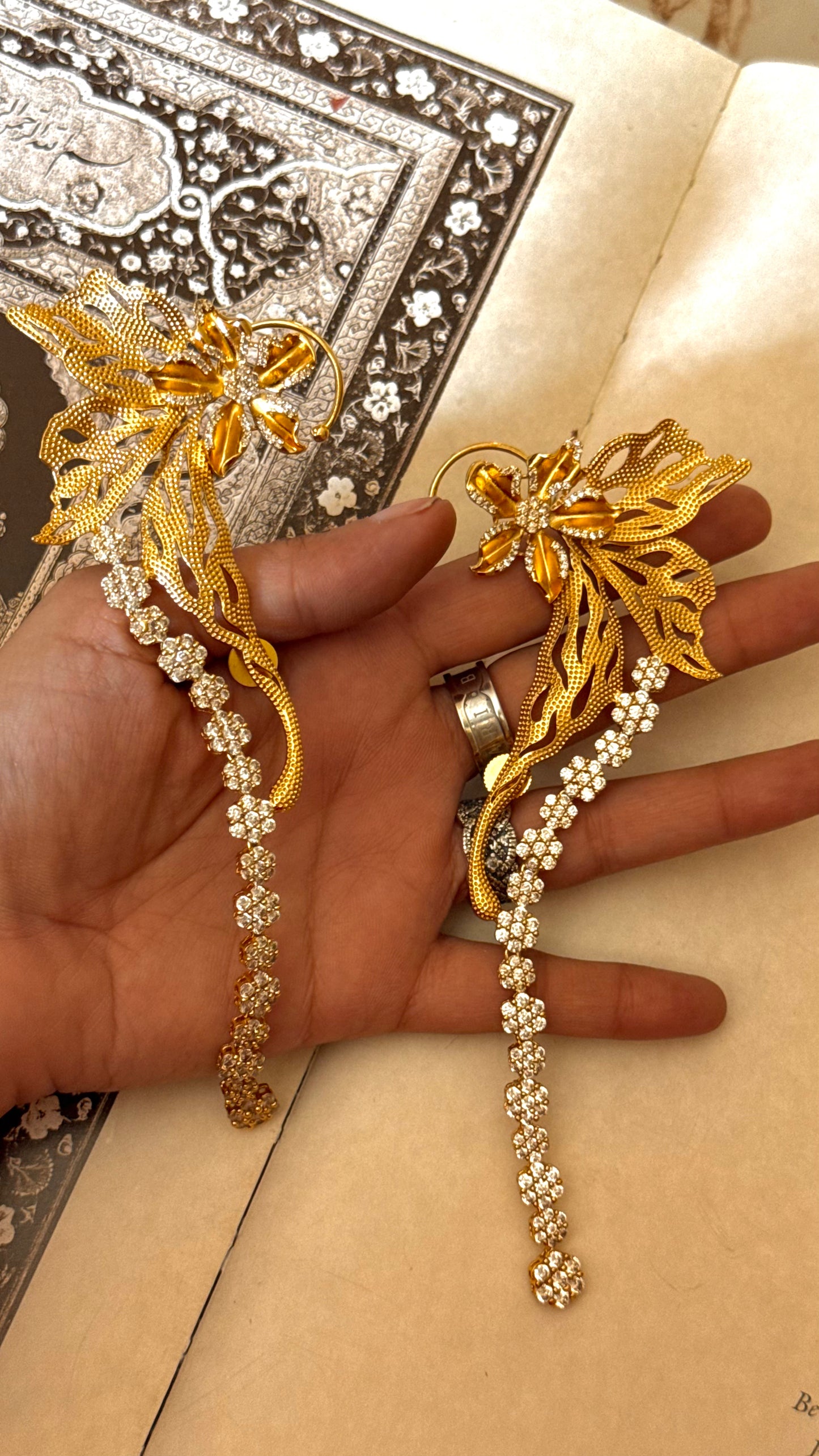 Designer Carnival ear cuff with floral diamond earrings