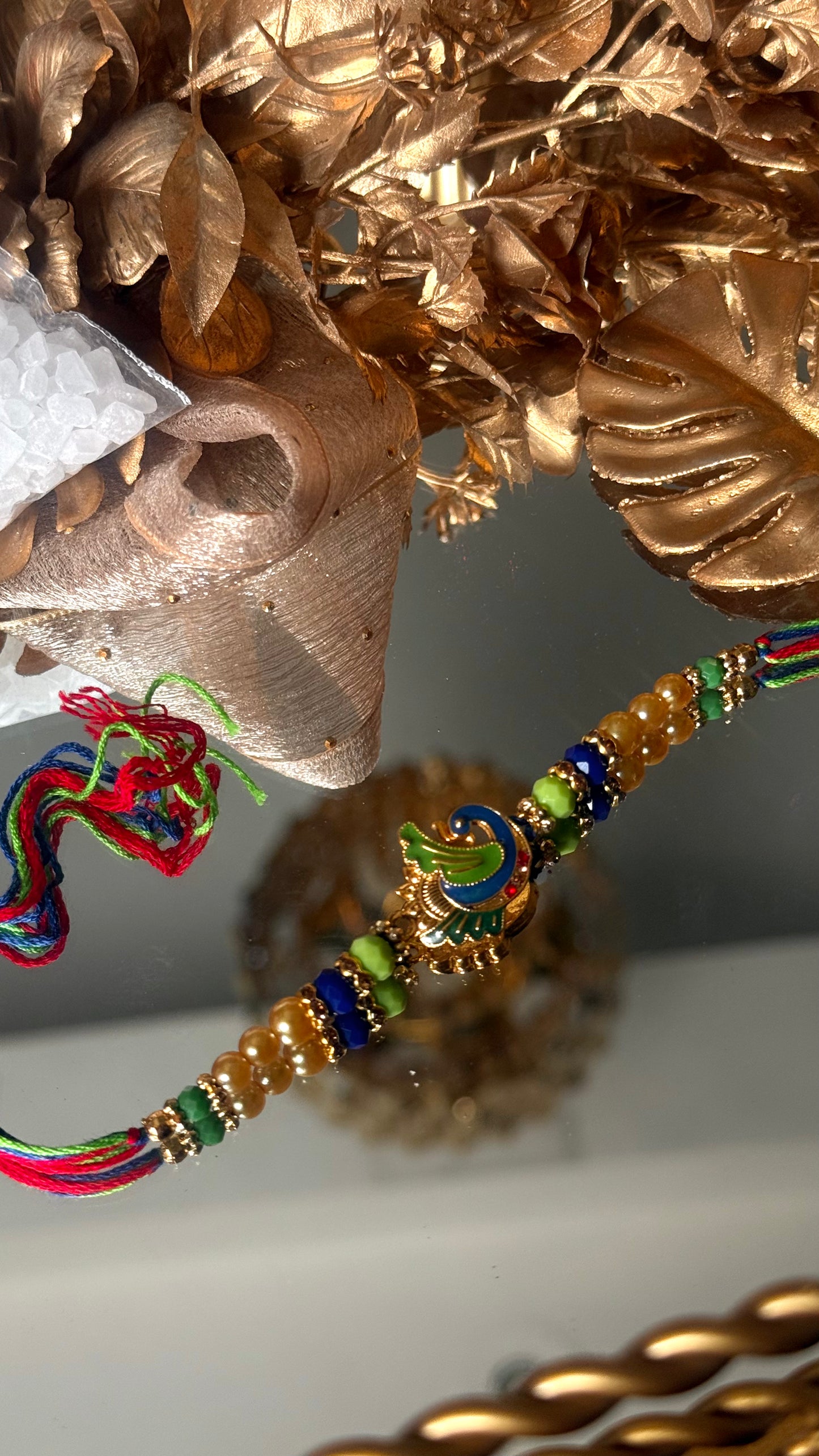Peacock inspired nakashi rakhi