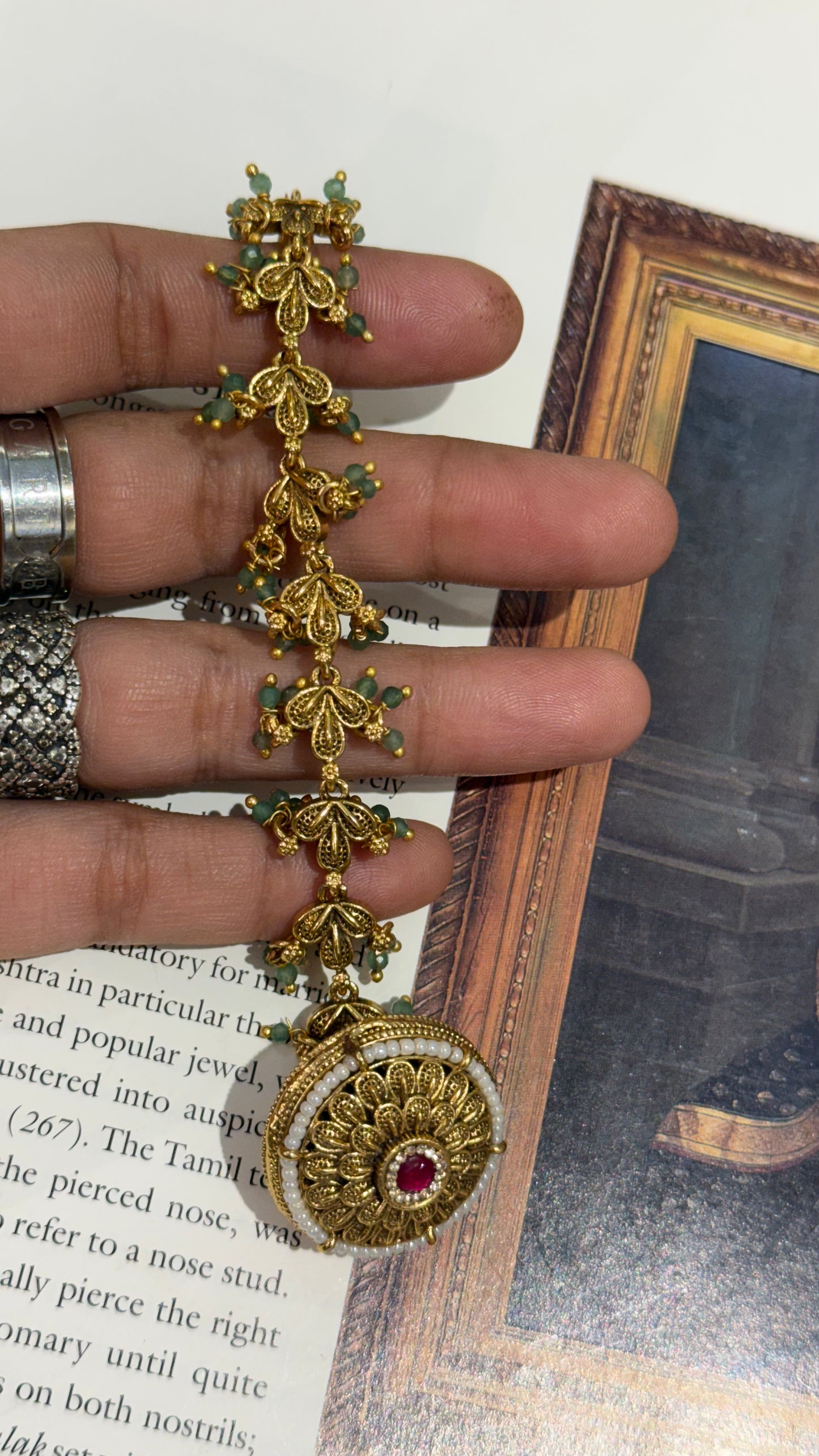 Oxidised gold nakshi borla with mint detailing