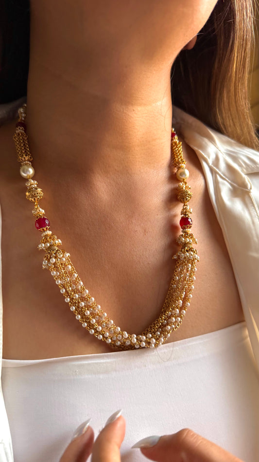 Ruby pearl golden string