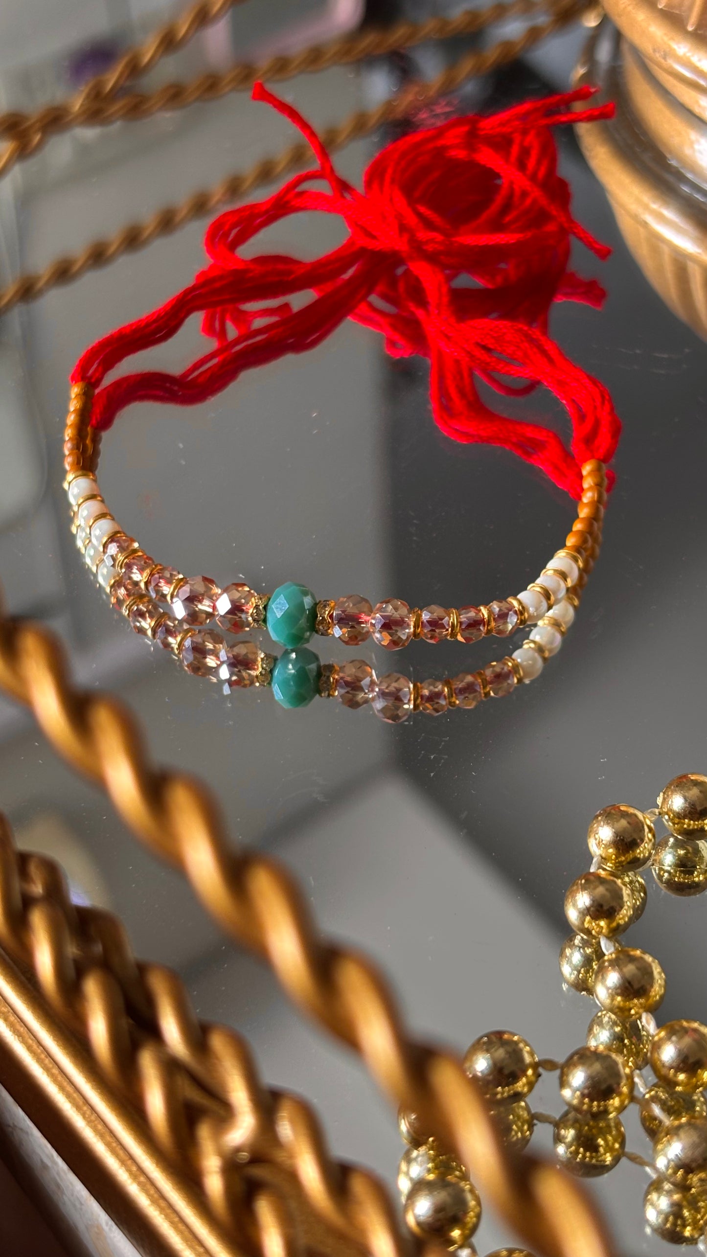 Firoza thread rakhi (shipping will be extra )
