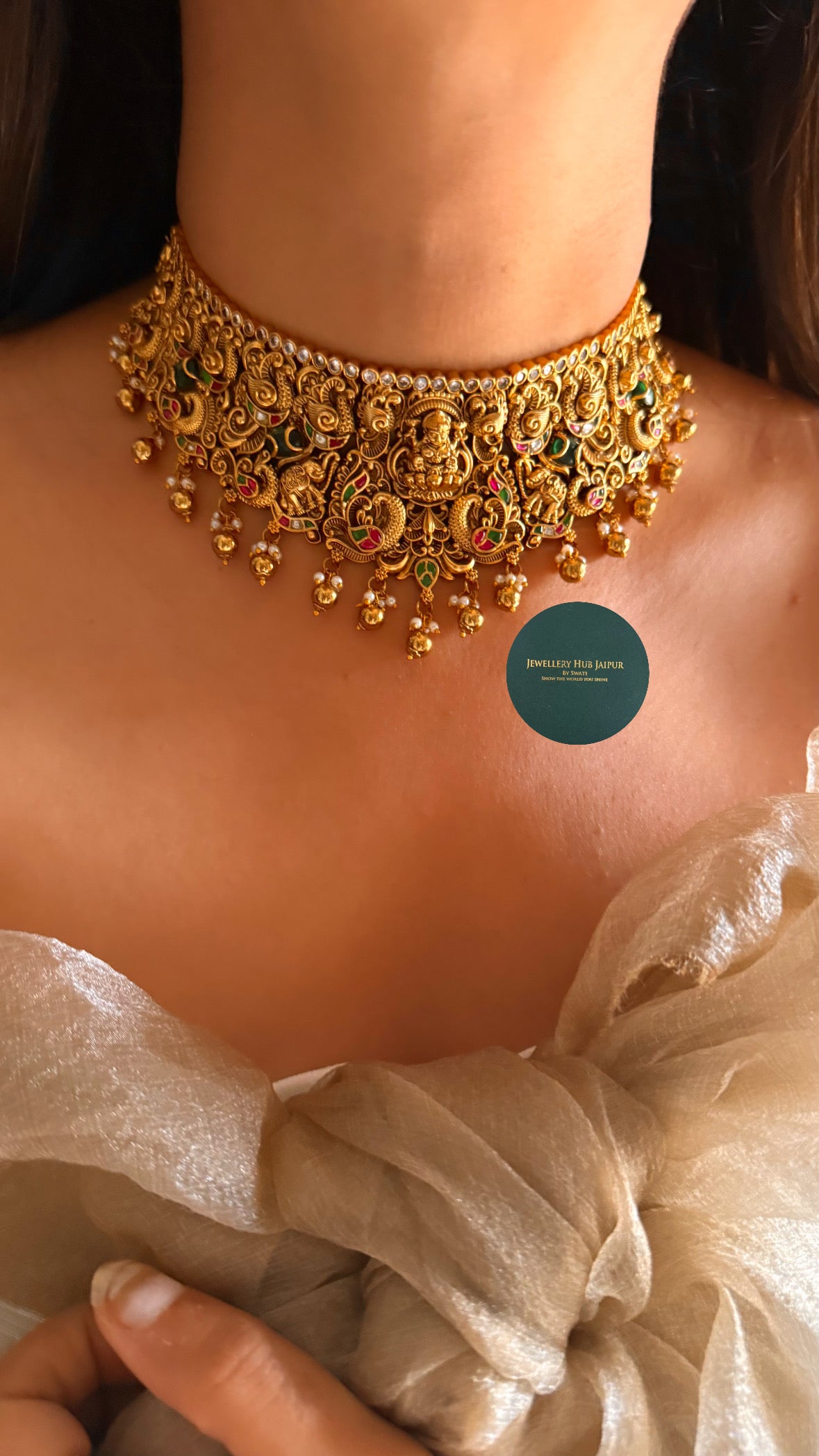 Goddess laxmi with emerald & rani pink choker set