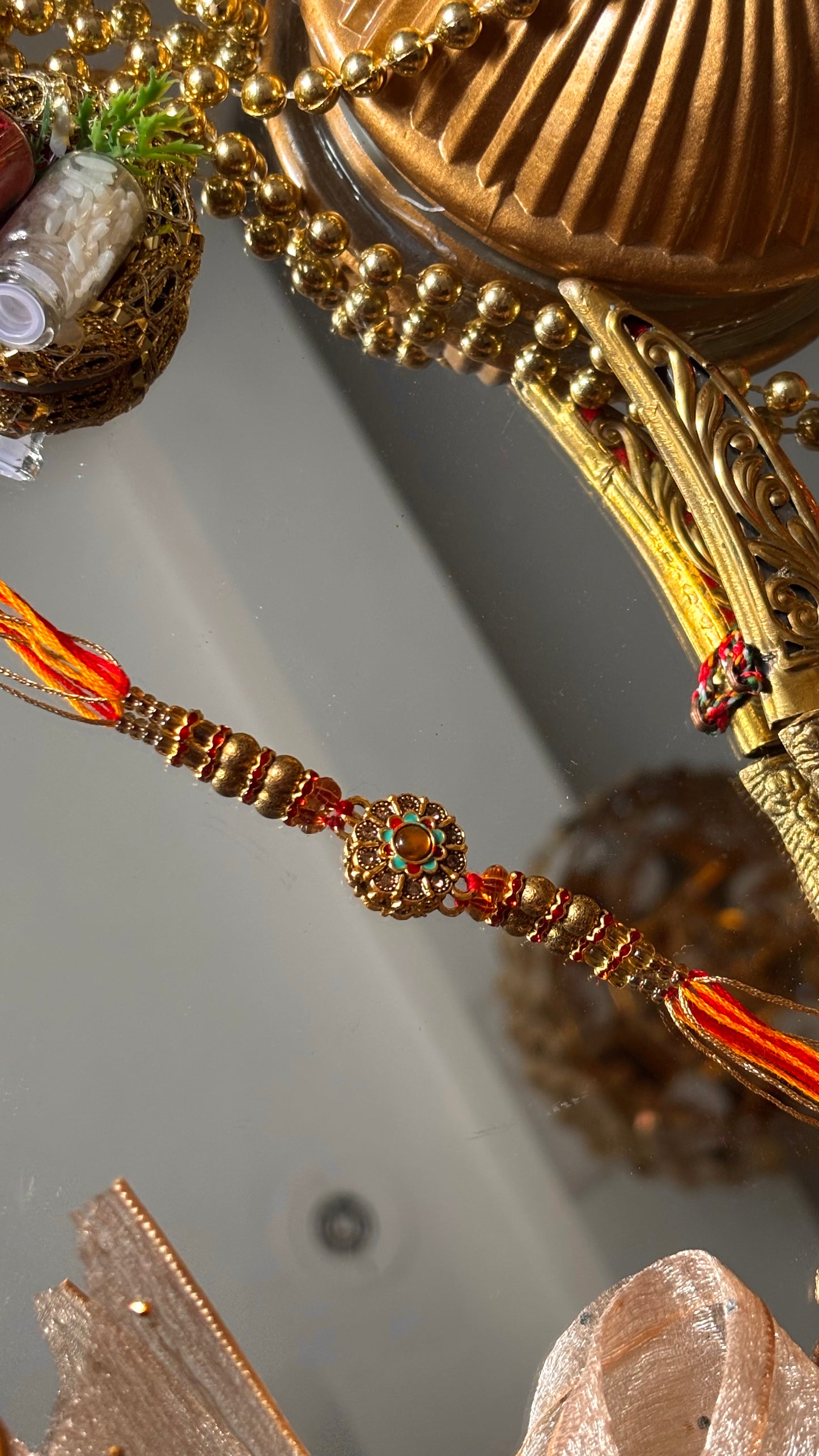 Floral hand painted nakashi oxidised gold Rakhi ( shipping will be extra )