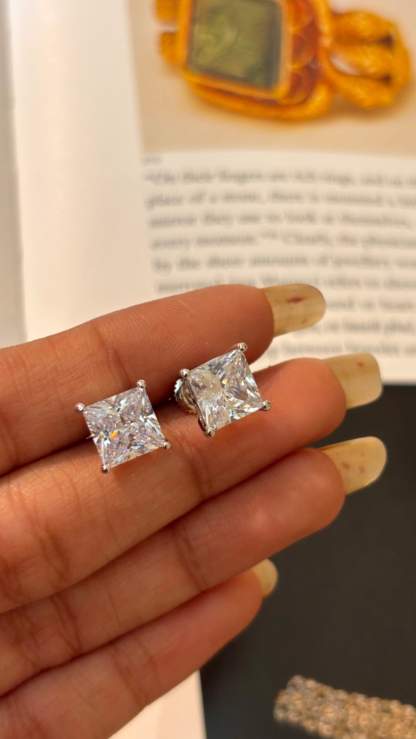 Emerald cut rhodium 1 carat diamond studs