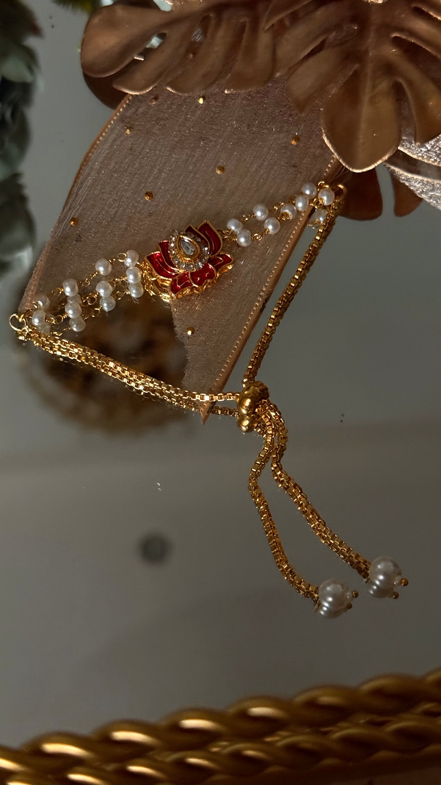 Ruby lotus inspired rakhi