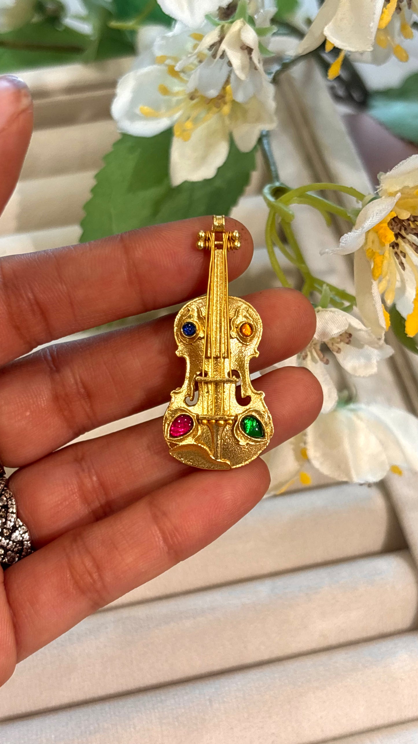 Guitar designer brooch