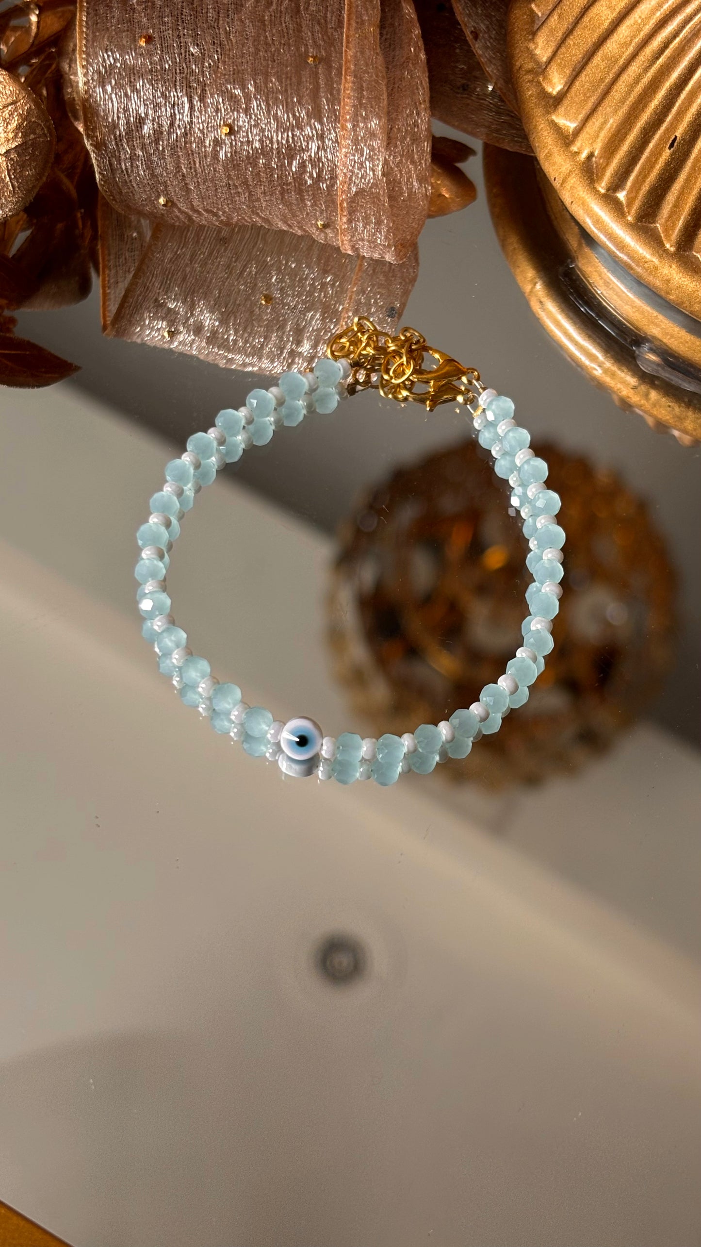 Evil eye rakhi (powder blue) (shipping will be extra )