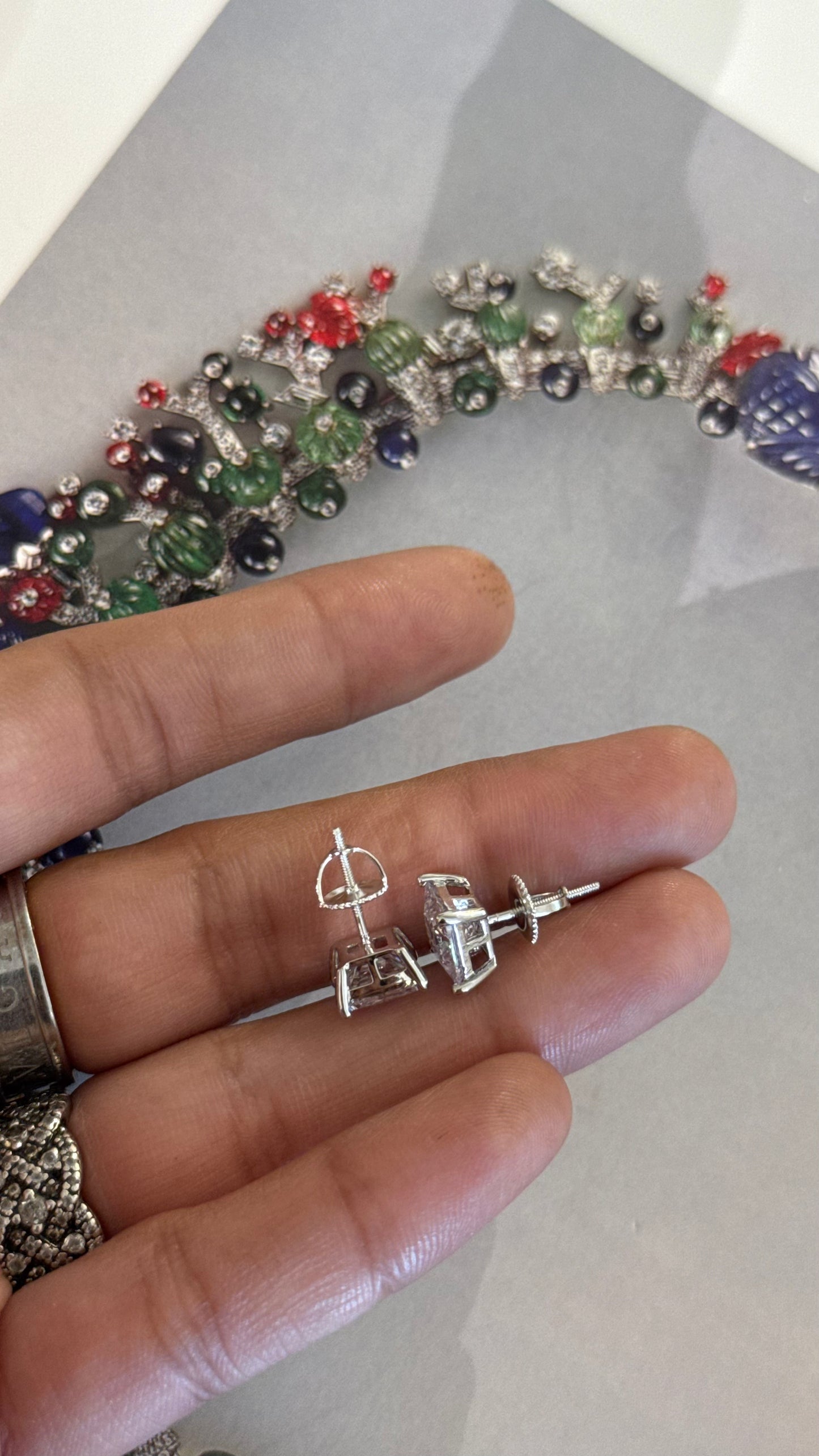 Rhodium Emerald cut diamond studs