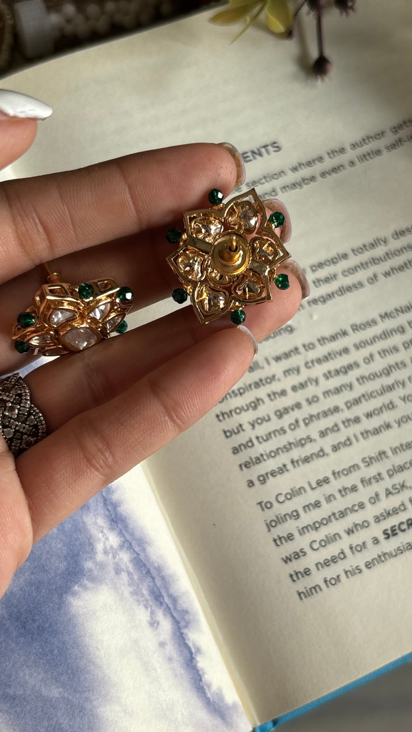 Polki studs with hint of emerald