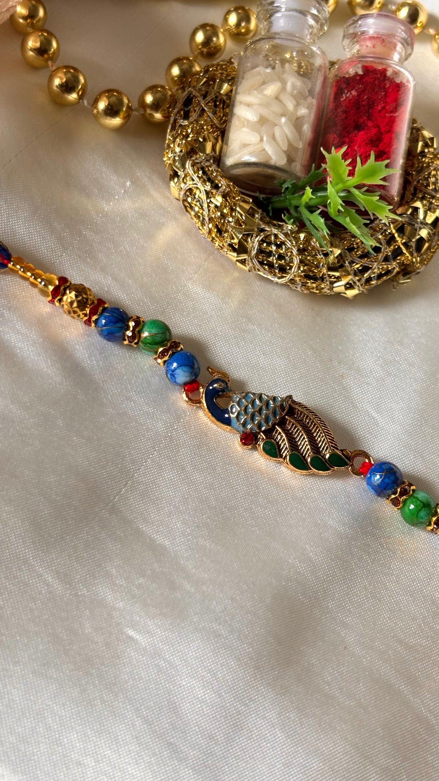Peacock designer minimalist rakhi ( shipping will be extra )