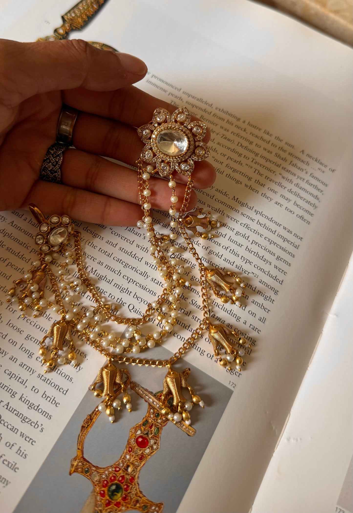Floral studs attached with fish drops Kaanchain