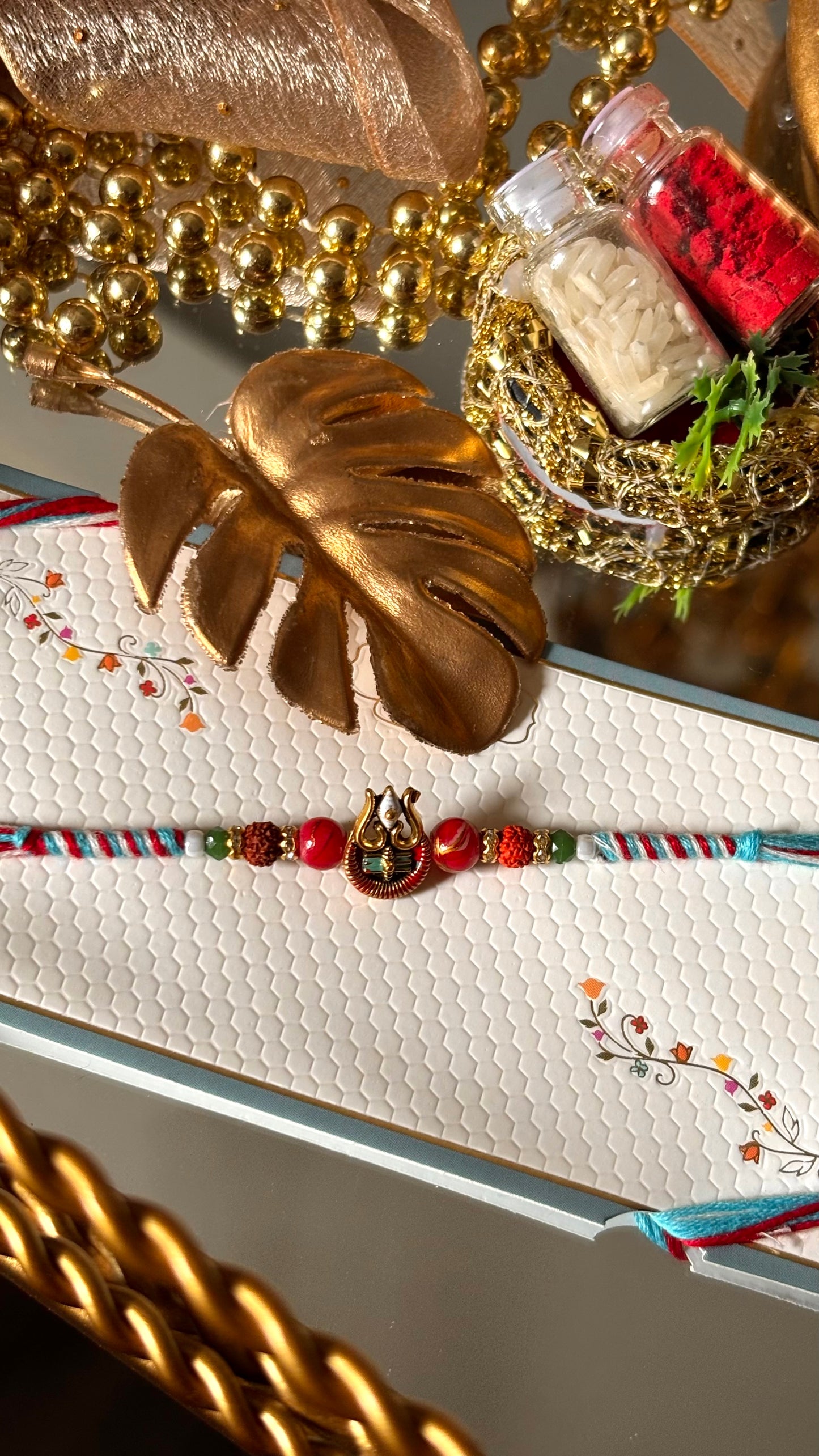 Lord shiva inspired rudraksh rakhi (red&blue) (shipping will be extra)
