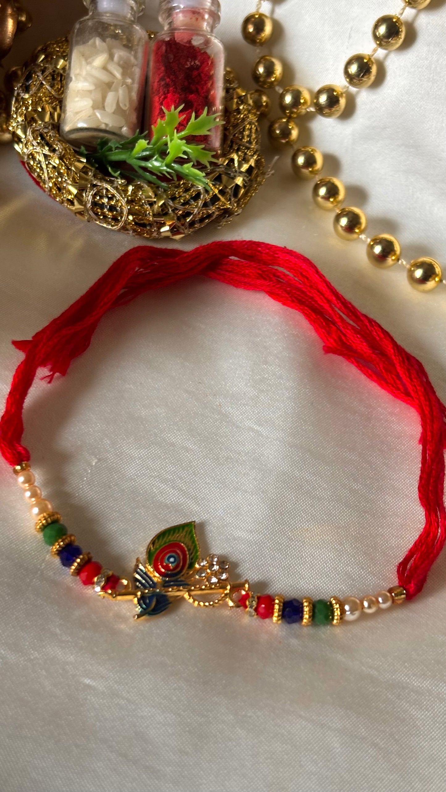 Morpankh inspired minimal rakhi ( shipping will be extra )