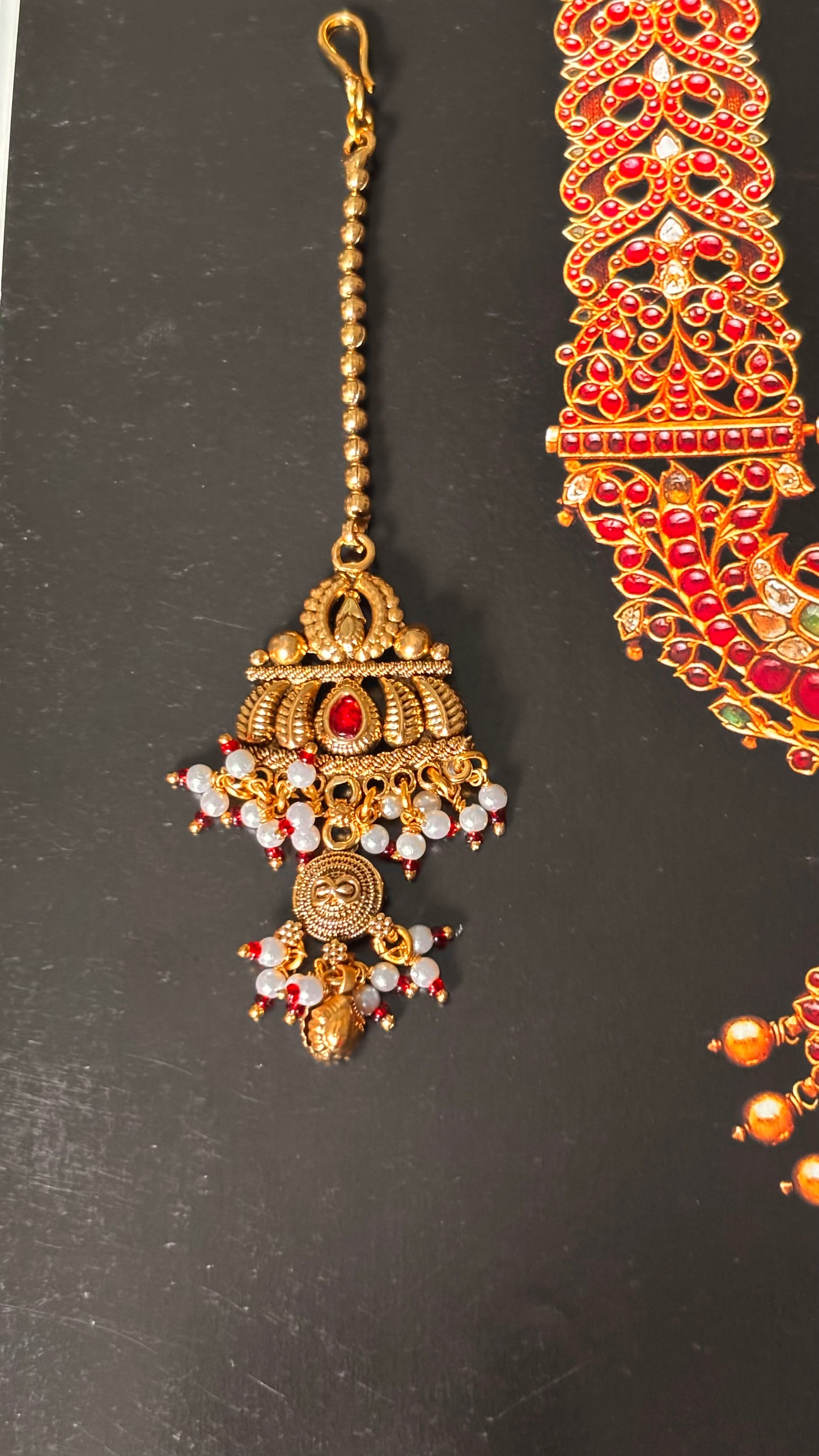 Ruby gold nakshi Maangtika