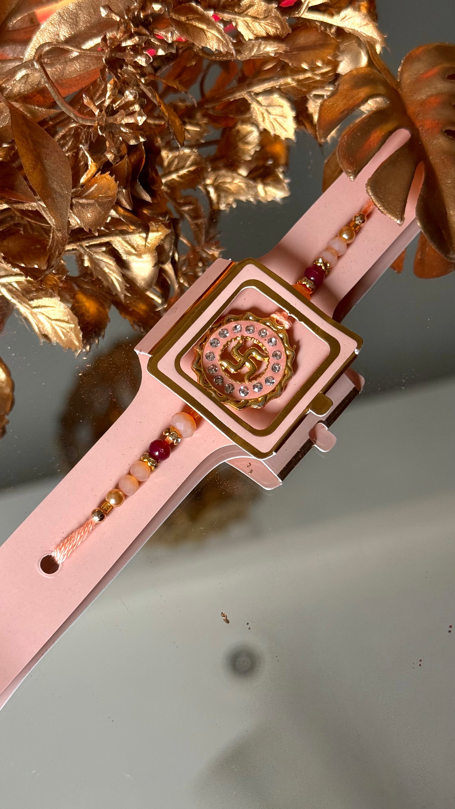 Peach swastik rakhi