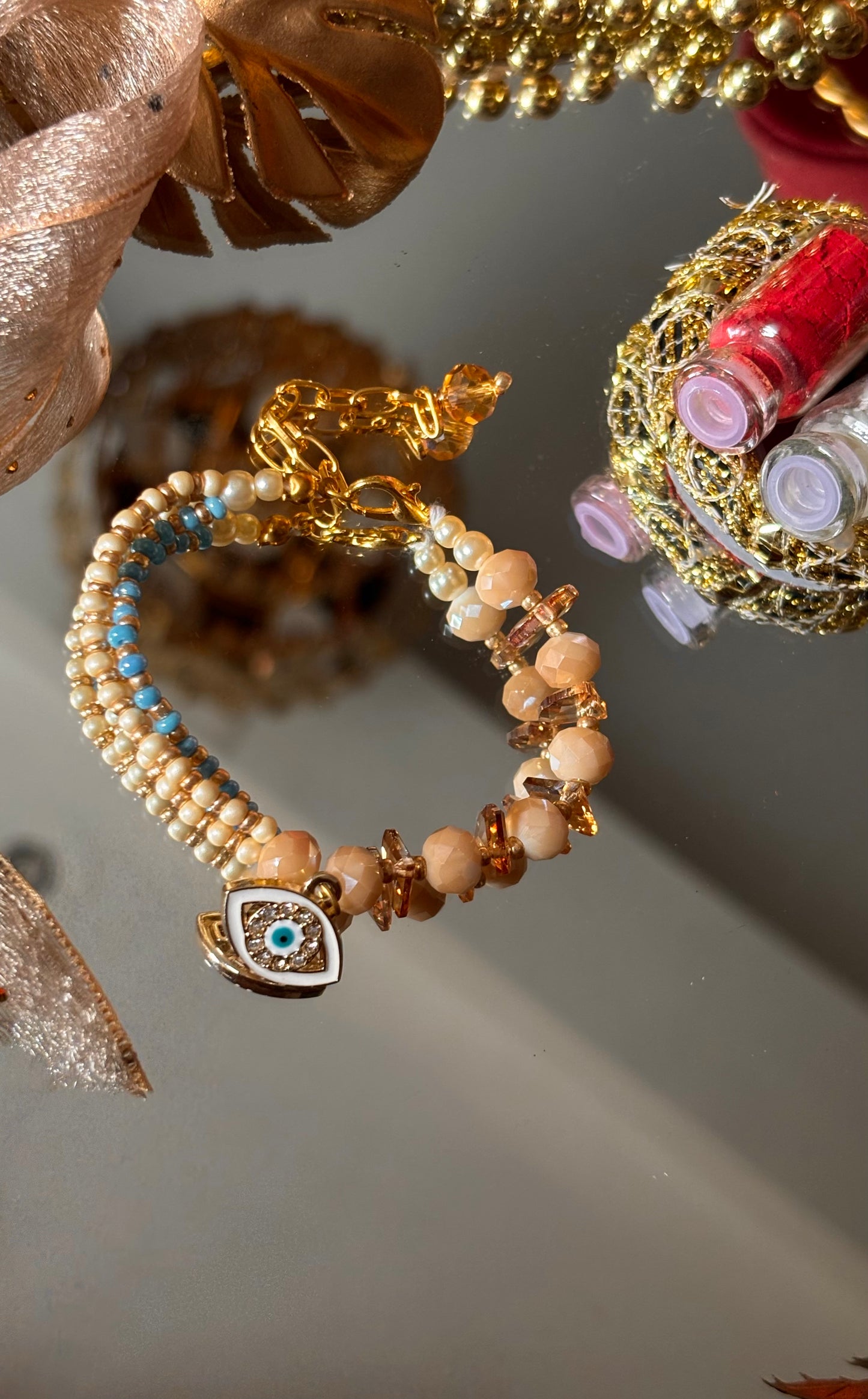 Evil eye peach & firoza designer Rakhi bracelet ( shipping will be extra )