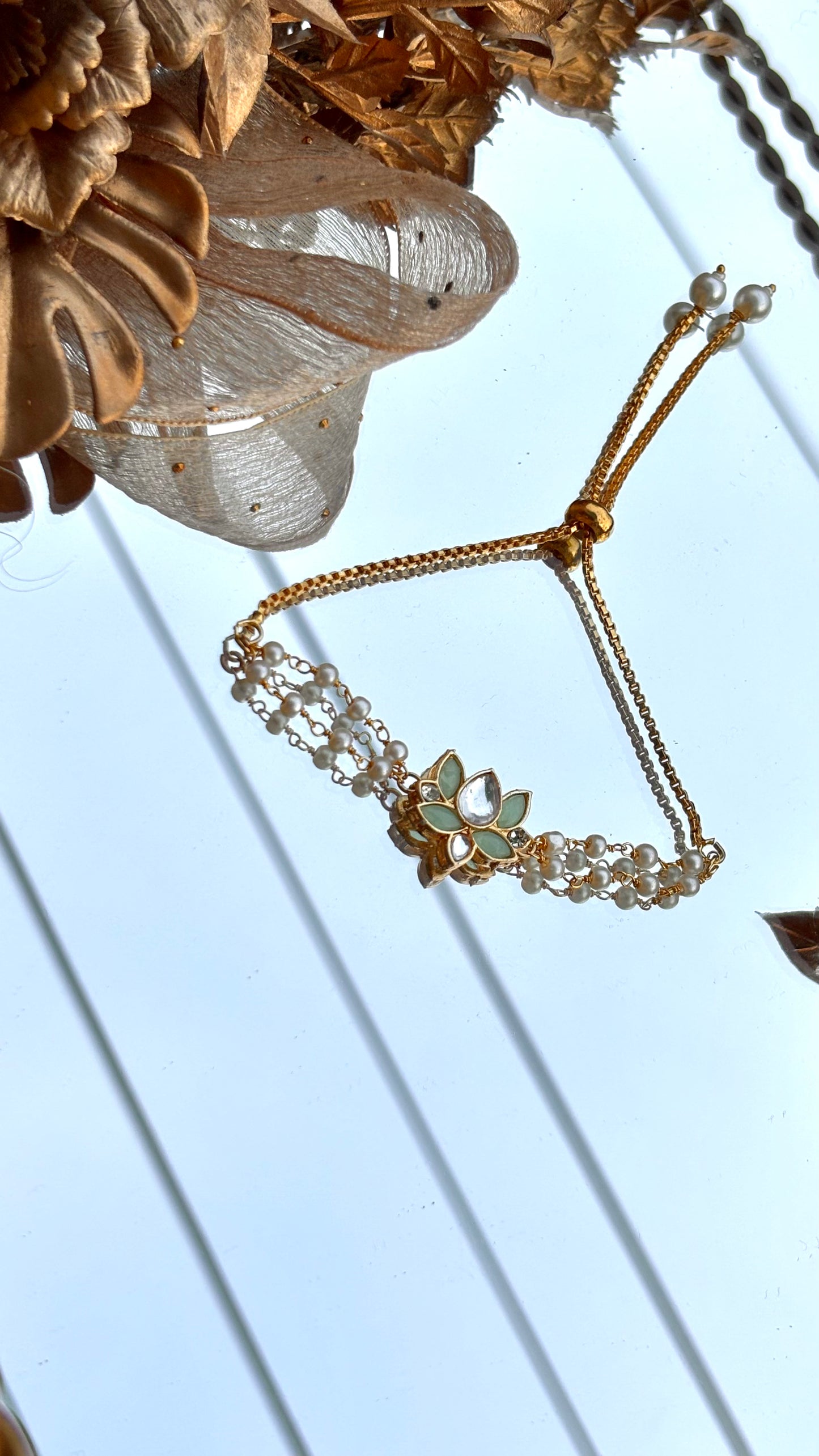 Mint Lotus inspired rakhi