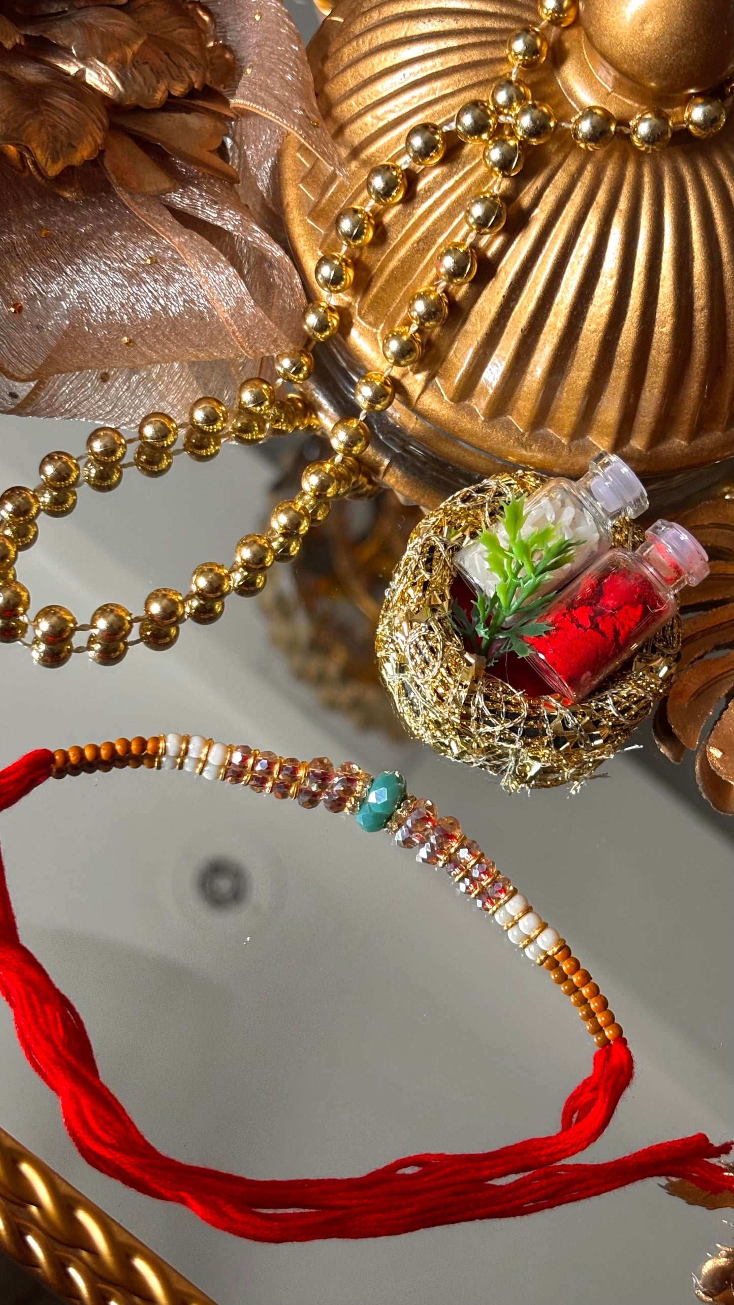 Firoza thread rakhi (shipping will be extra )