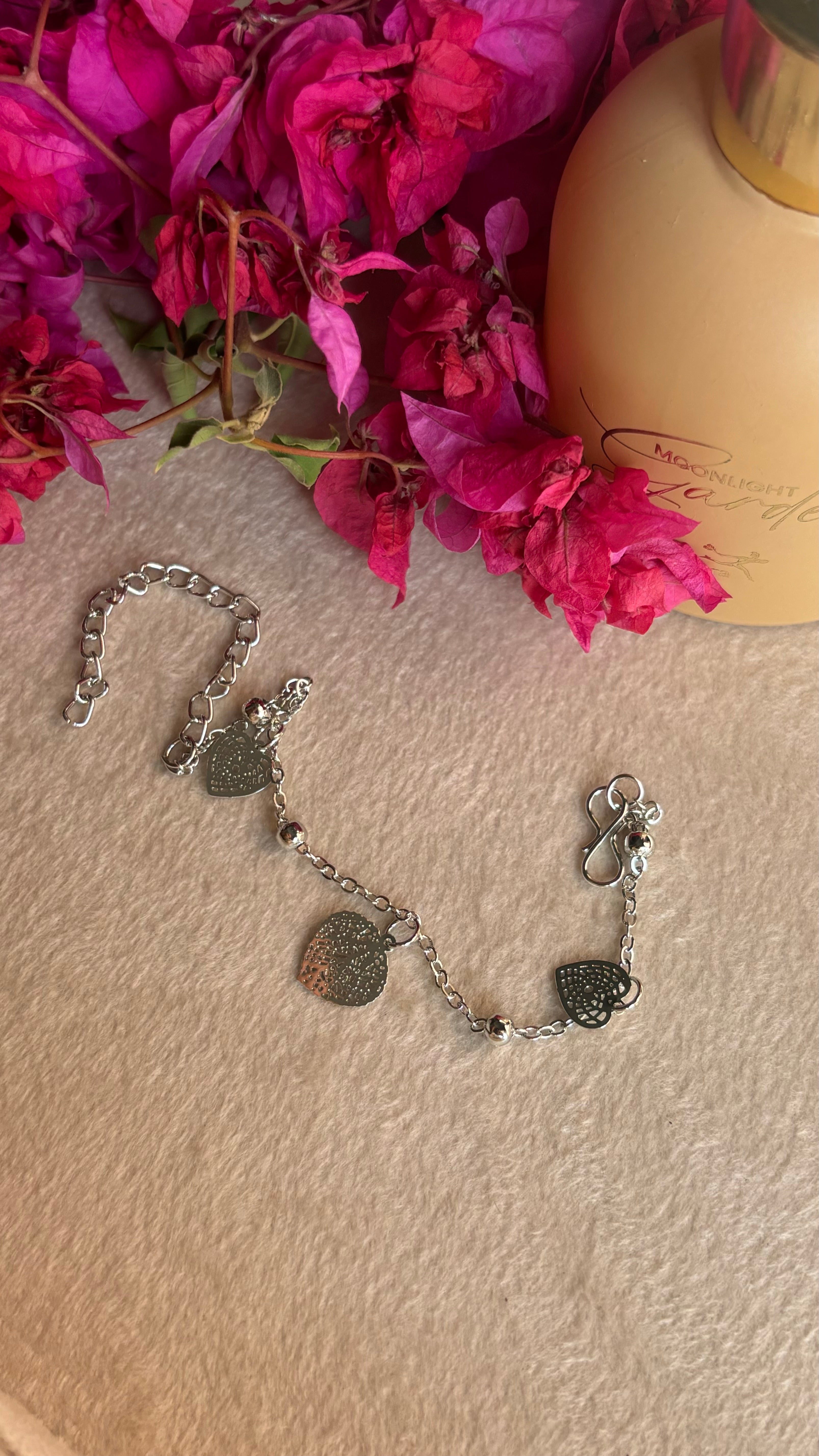 Rhodium triple heart bracelet