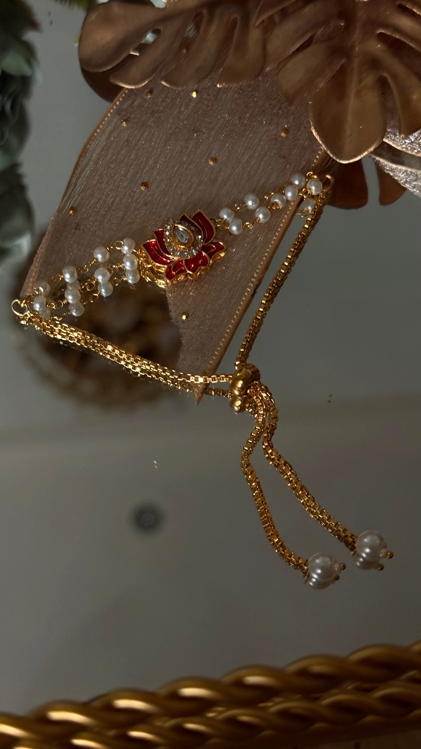 Ruby lotus inspired rakhi