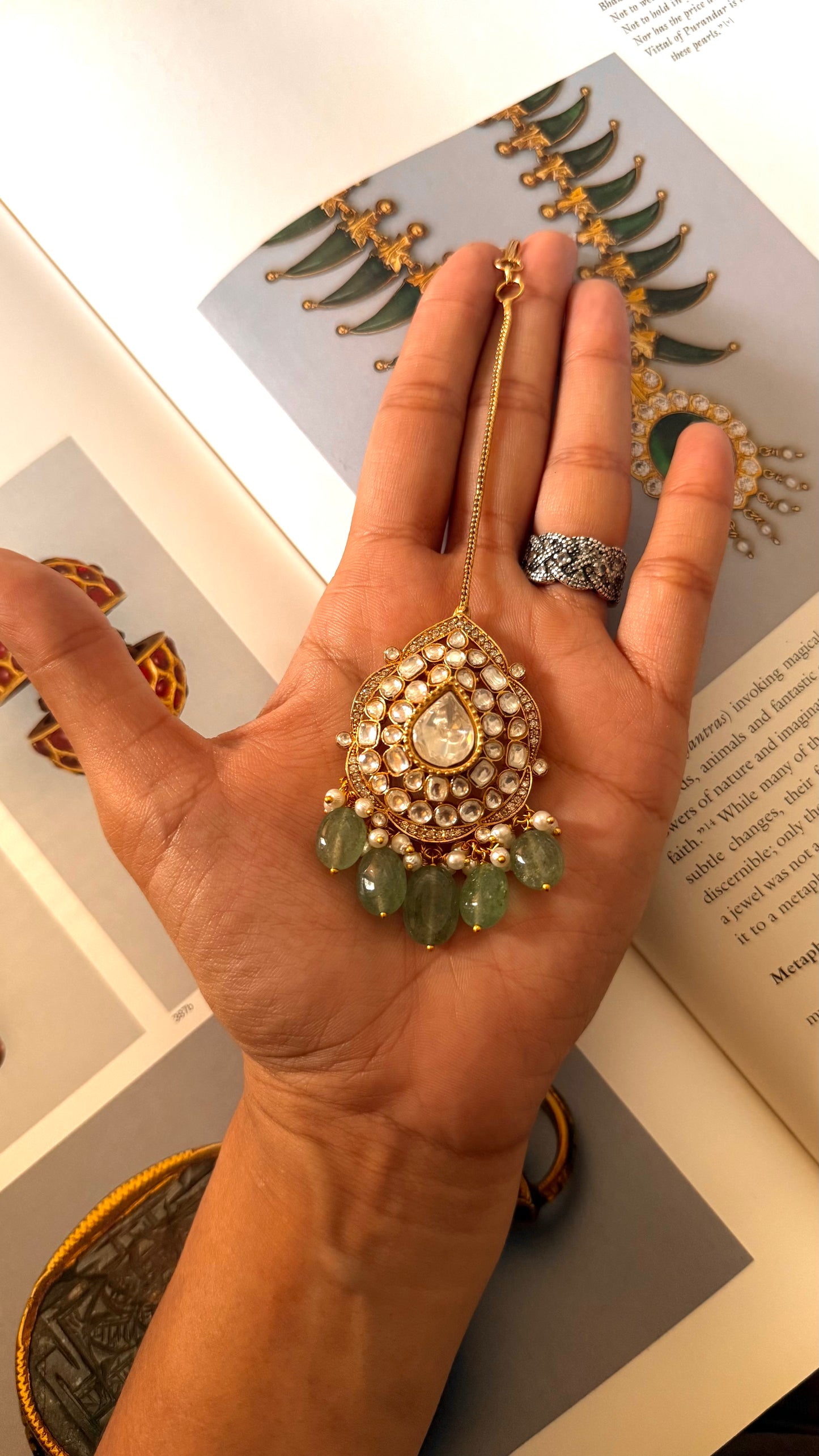 Emerald meenakari polki with mint maangtika