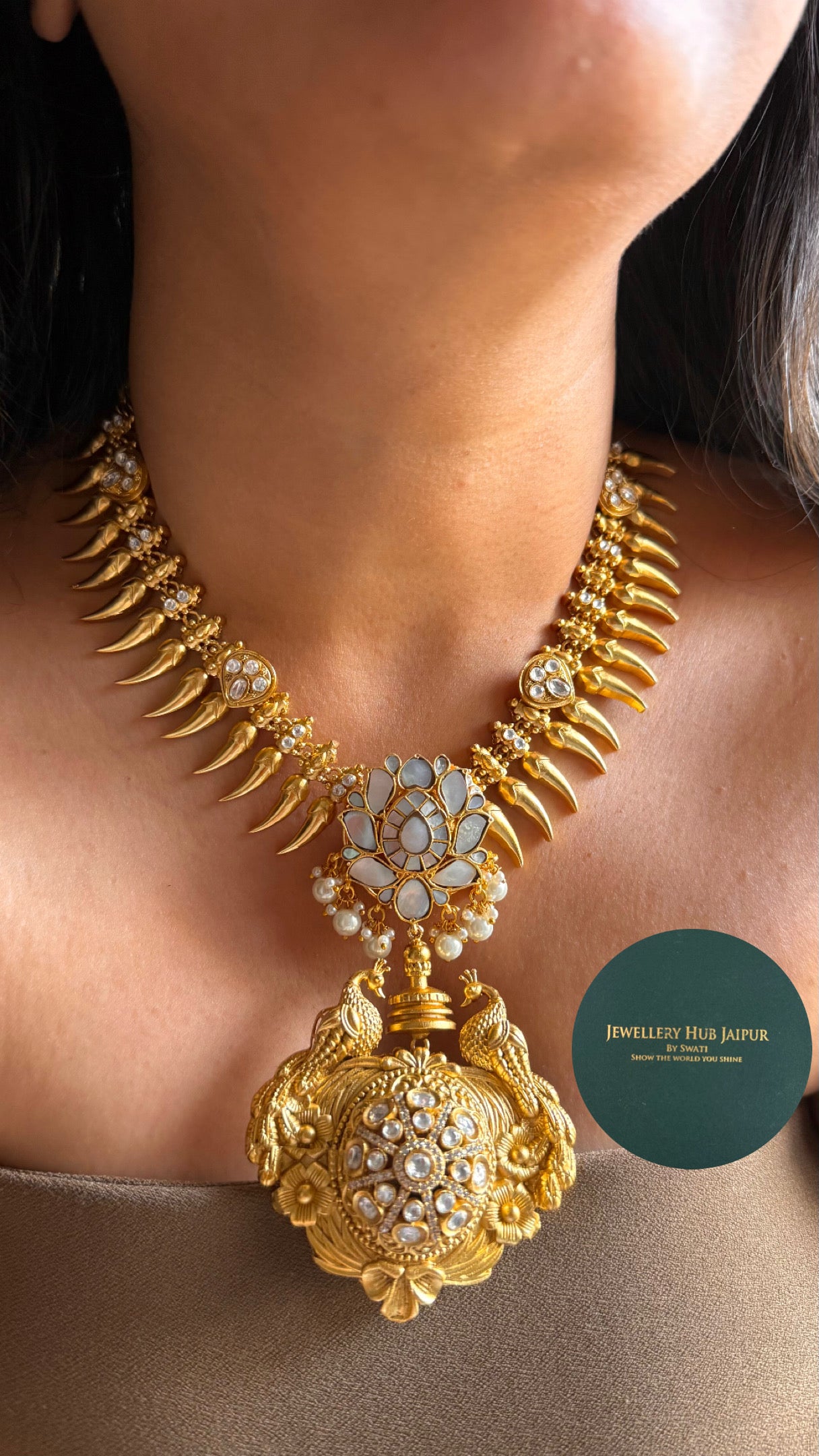 Peacock inspired designer gold polish contemporary necklace