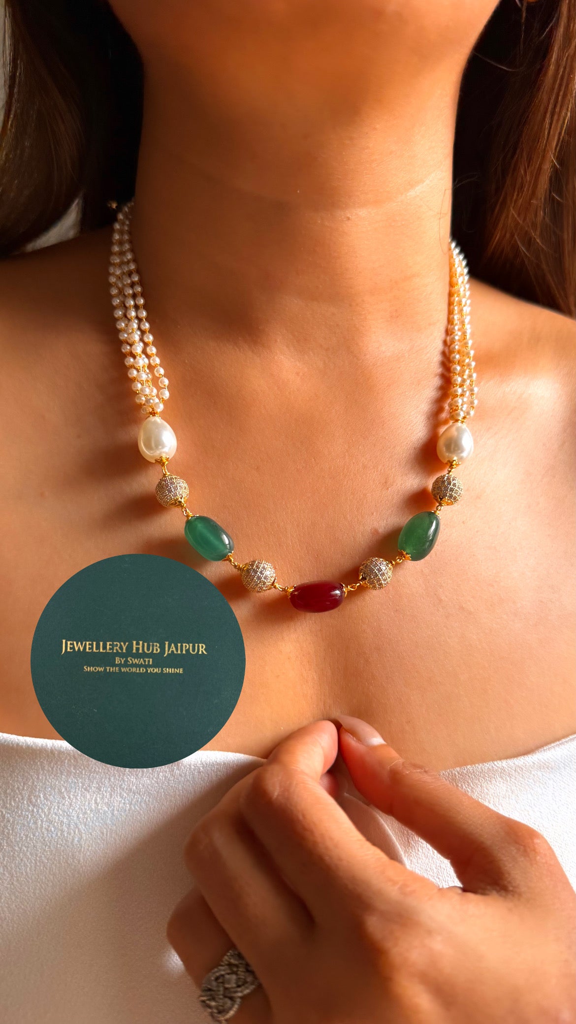 Emerald & ruby pearl string