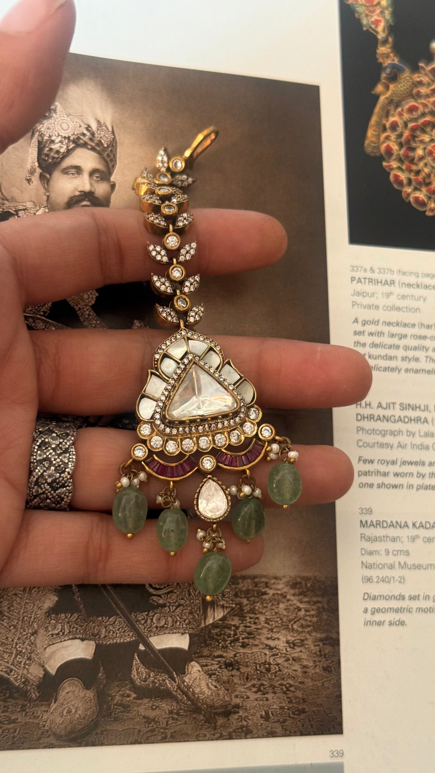 Mother of pearl maangtika with ruby detailing