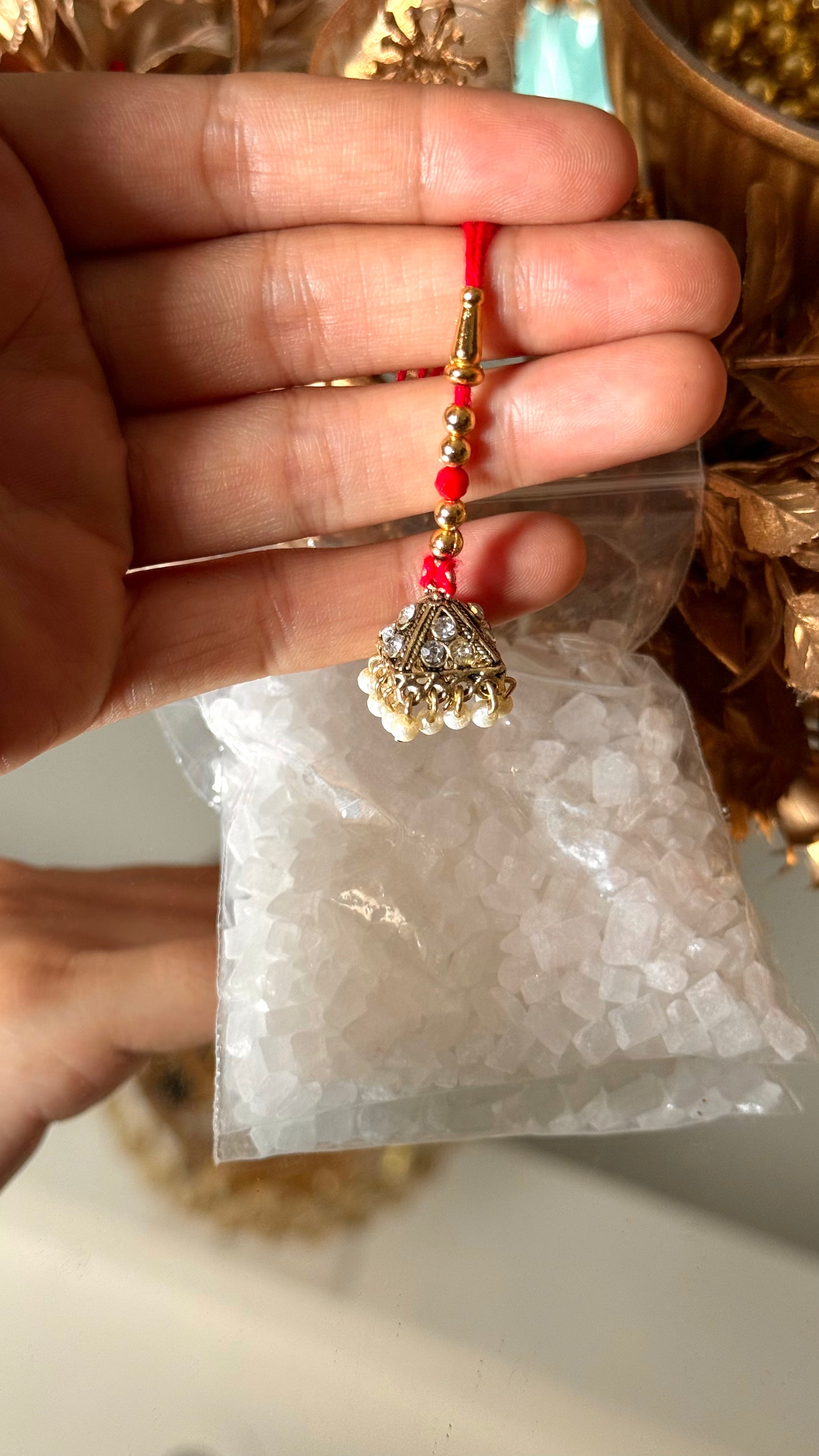 Gold jhumki rakhi