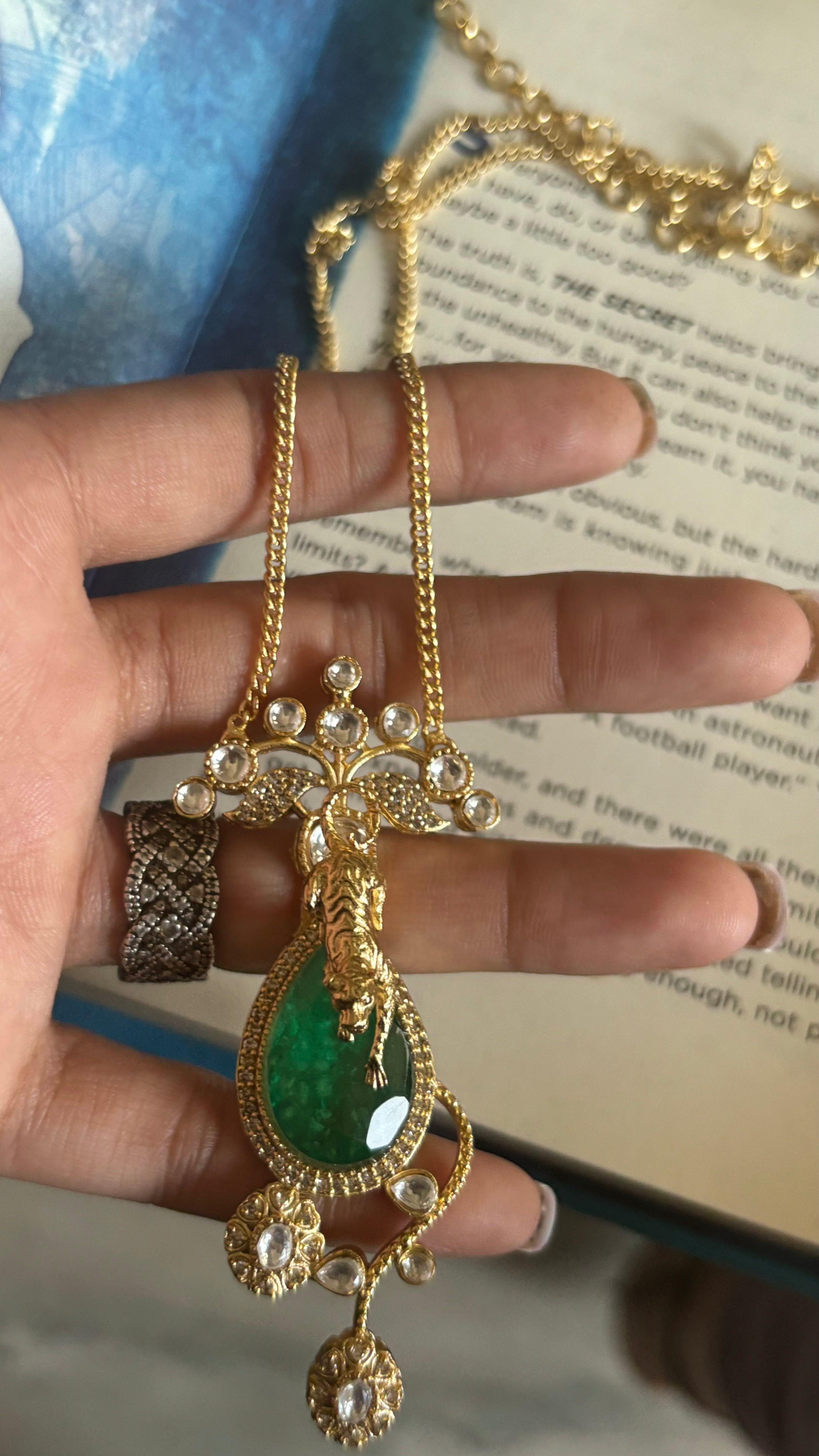 Emerald sabhysachi tiger down pendant set