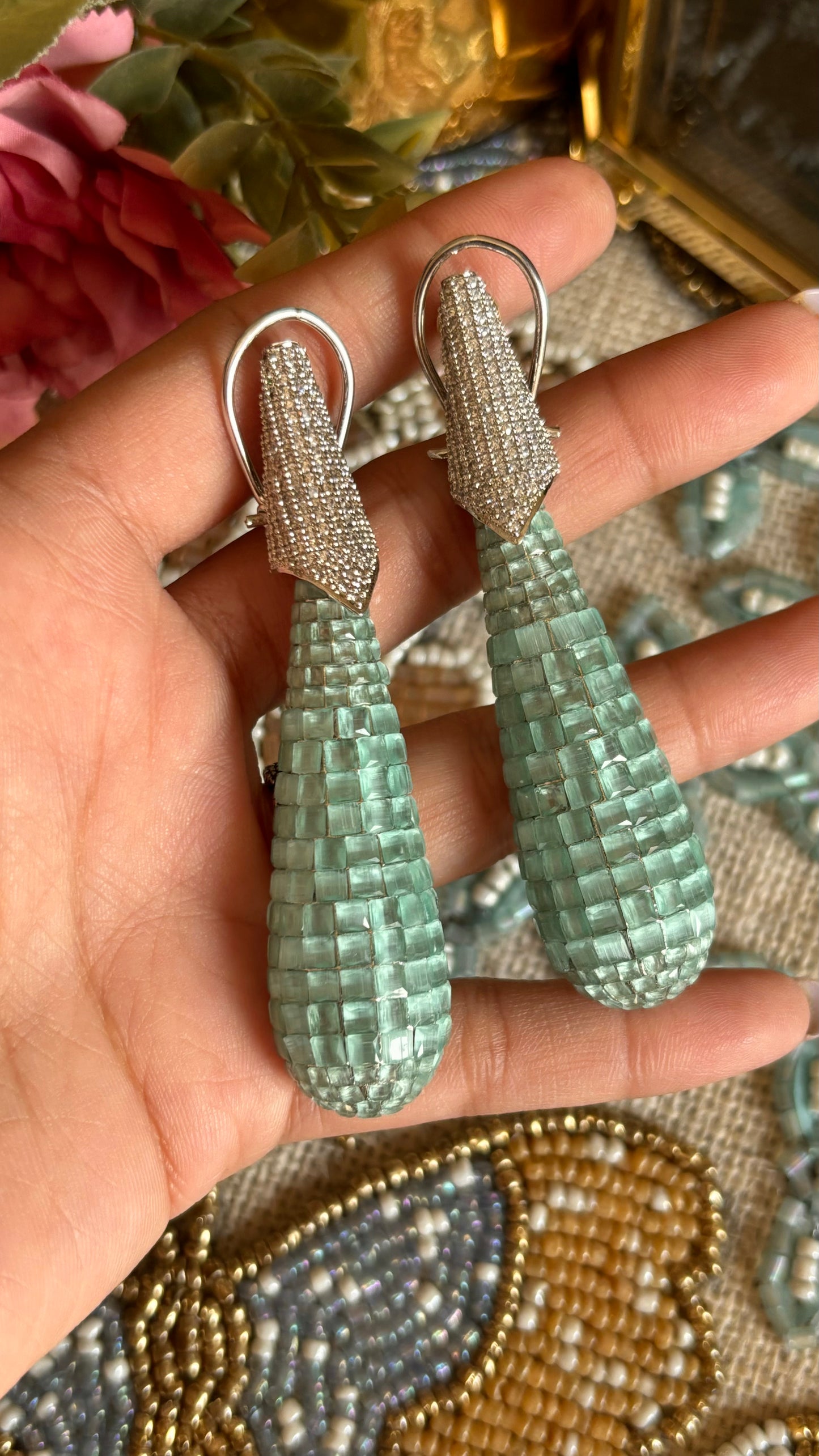 Mint danglers with invisible setting