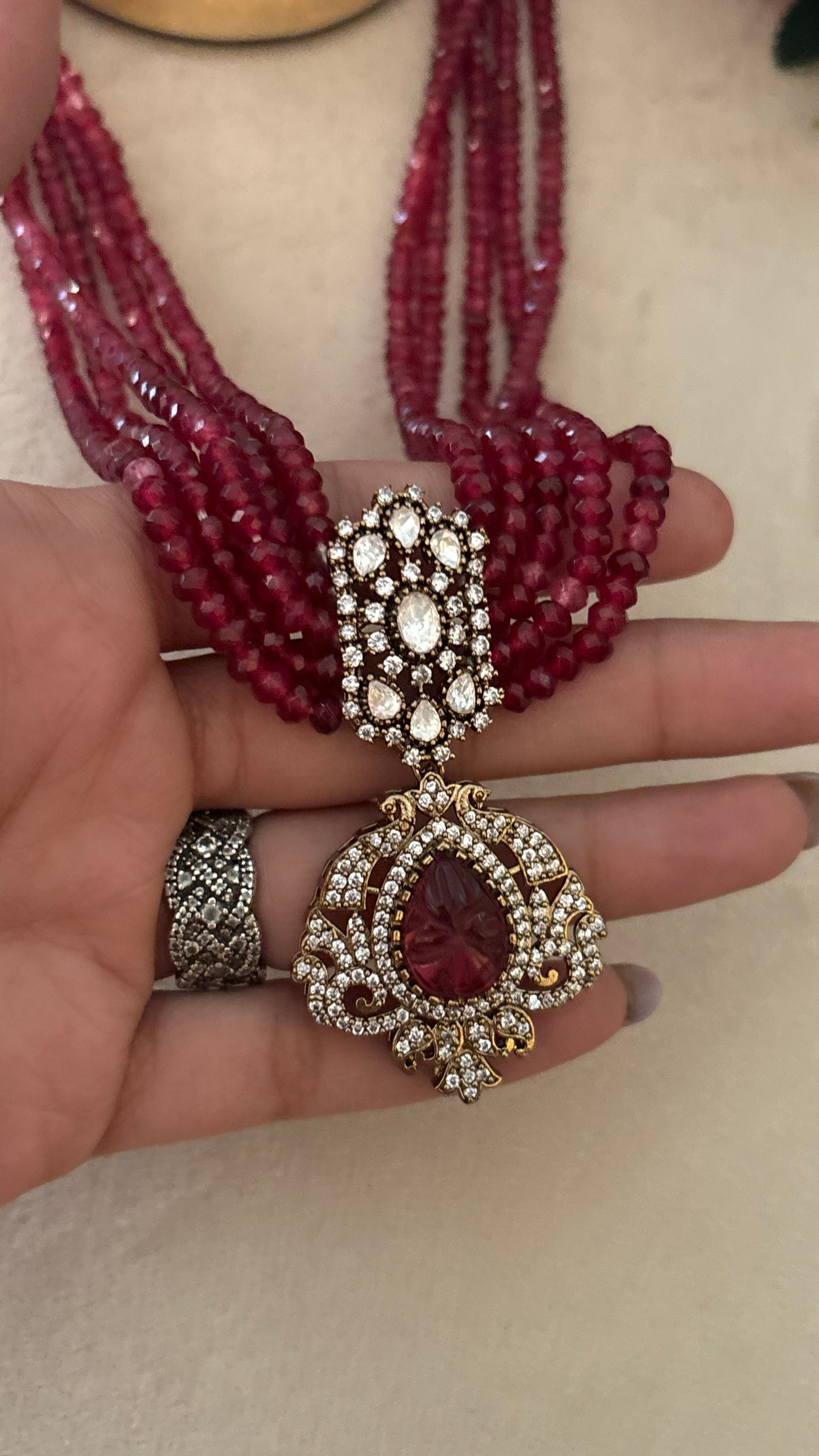 Ruby pendant set with earrings