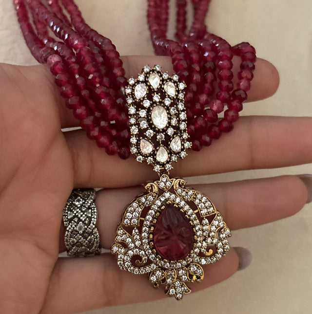 Ruby pendant set with earrings