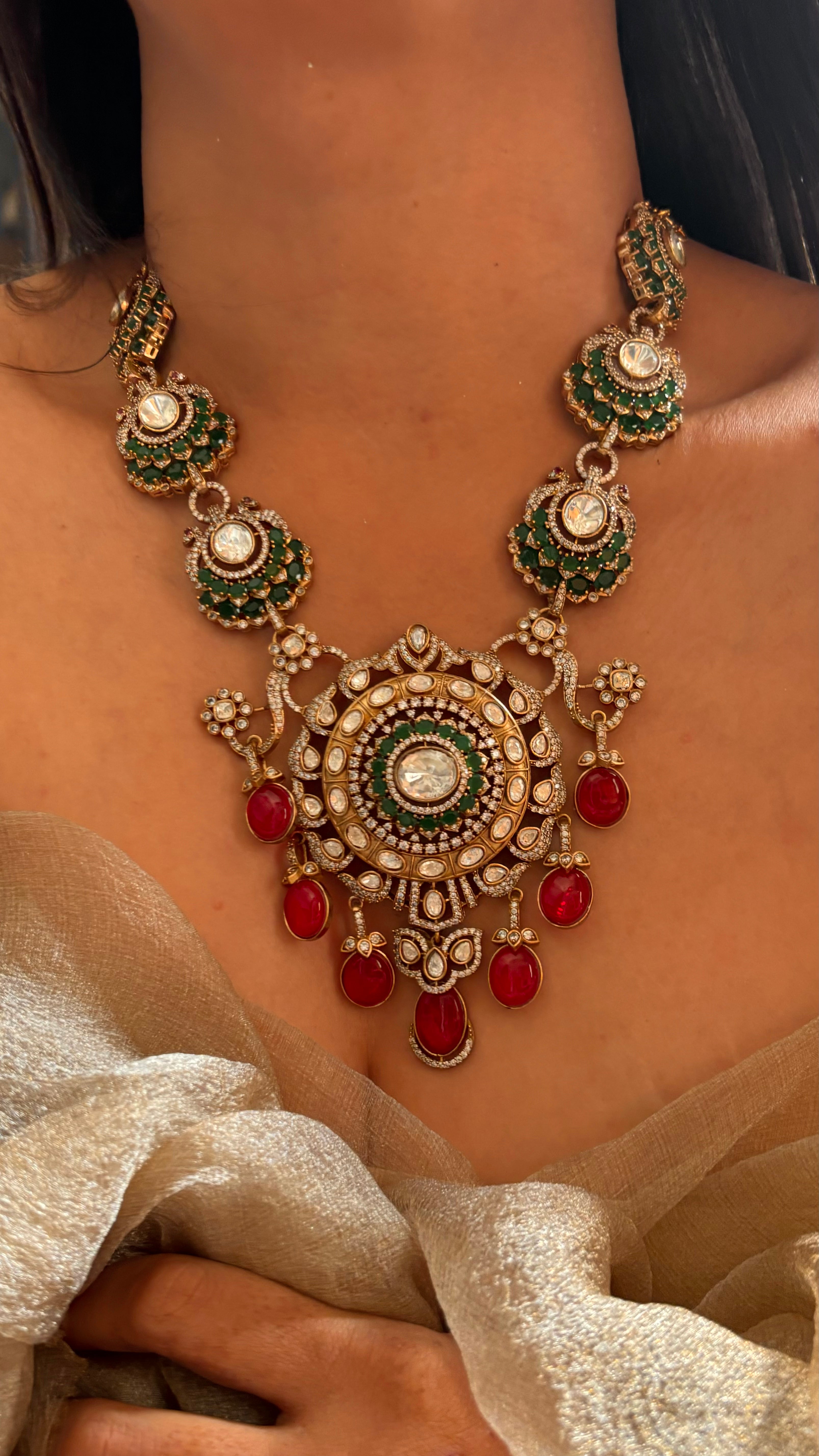 Emerald and ruby mid neck set